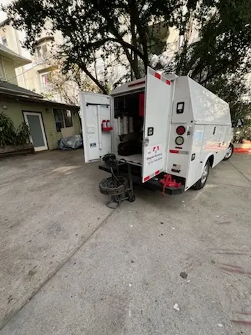 Magnet Plumbing service vehicle on-site for Grease Trap Cleaning in Palmetto Bay